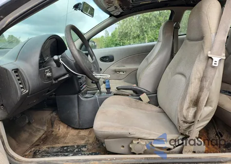 1999 Saturn Sc1 z USA, uszkodzony, nr VIN 1G8ZP1287XZ243932